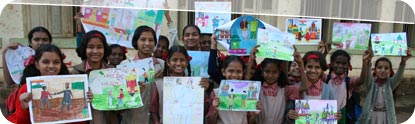 Lot of school kids holding up their penpal letters